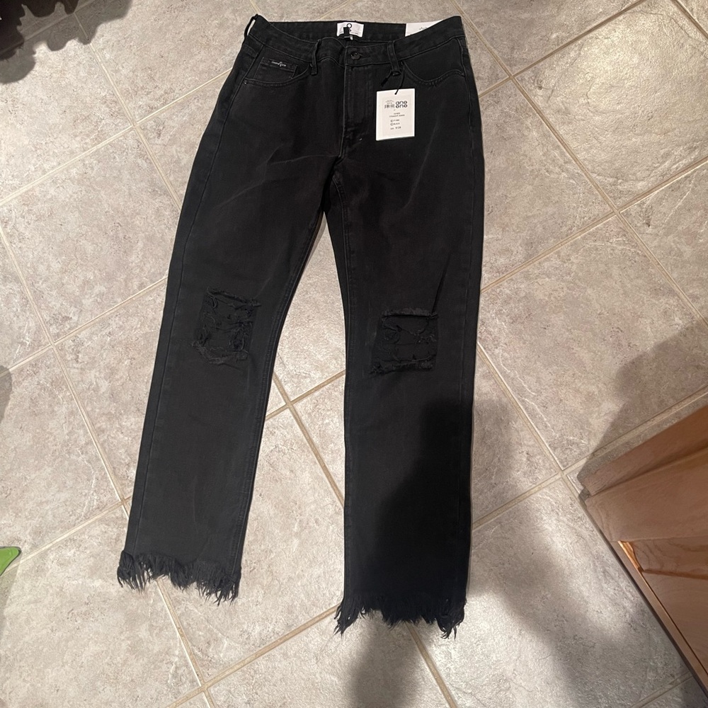 Edgy Black Distressed Women's Cropped Jeans